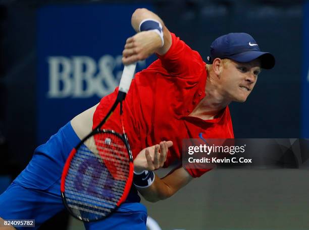 Kyle Edmund of Great Britain serves to Jack Sock during the BB&T Atlanta Open at Atlantic Station on July 28, 2017 in Atlanta, Georgia.