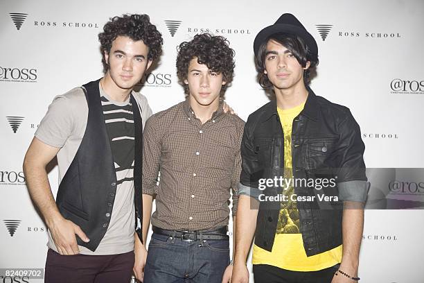 Kevin Jonas, Nick Jonas and Joe Jonas pose for a portrait for the Jonas Brothers performance at The Ross School on August 9, 2008 in East Hampton,...