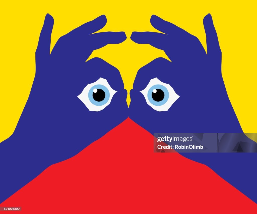Ojo mirando a través de los dedos