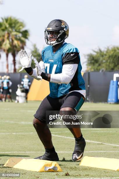 Tackle Cam Robinson of the Jacksonville Jaguars works out during Training Camp at Florida Blue Health and Wellness Practice Fields on July 28, 2017...