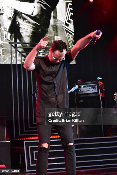 Singer Michael Fitzpatrick performs during the OneRepublic With Fitz & The Tantrums And James Arthur In Concert show at PNC Bank Arts Center on July...