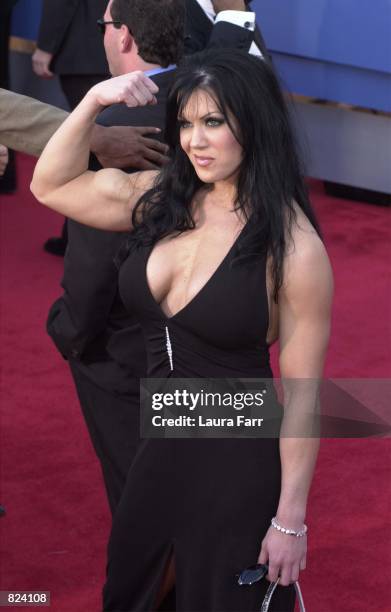 Wrestler Chyna flexes her muscles at the 43rd Annual Grammy Awards held at Staples Center February 21, 2001 in Los Angeles, CA.