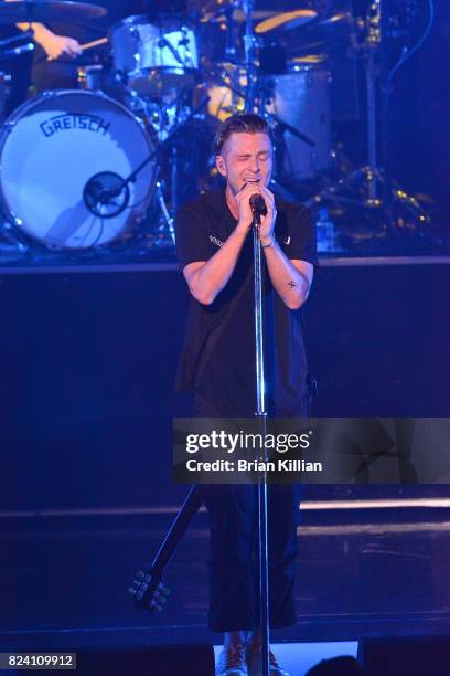 Singer Ryan Tedder of One Republic performs during the OneRepublic With Fitz & The Tantrums And James Arthur In Concert show at PNC Bank Arts Center...