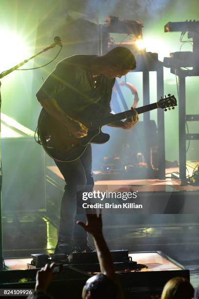 Guitarist Zach Filkins of OneRepublic performs during the OneRepublic With Fitz & The Tantrums And James Arthur In Concert show at PNC Bank Arts...