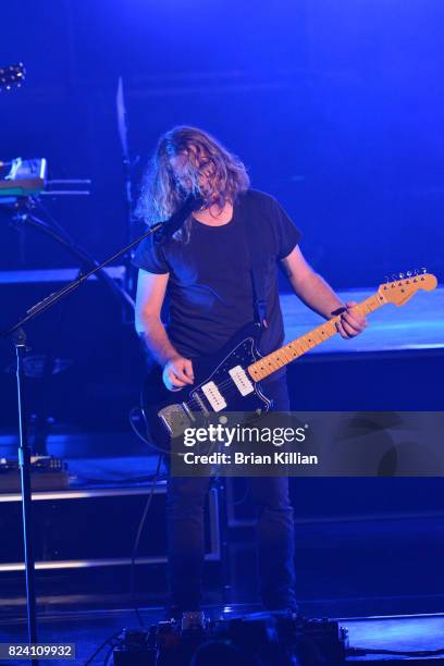 Guitarist Drew Brown of OneRepublic performs during the OneRepublic With Fitz & The Tantrums And James Arthur In Concert show at PNC Bank Arts Center...