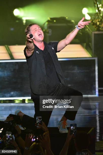 Singer Ryan Tedder of OneRepublic performs during the OneRepublic With Fitz & The Tantrums And James Arthur In Concert show at PNC Bank Arts Center...