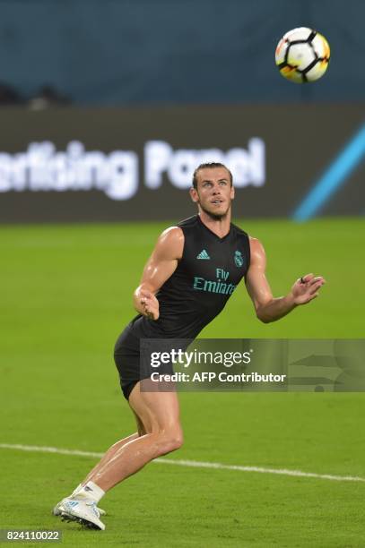 Real Madrid player Gareth Bale takes part in a training session at Hard Rock Stadium in Miami, Florida, on July 28 one day before their International...