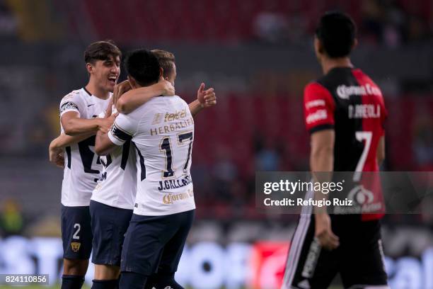 Abraham Gonzalez of Pumas celebrates with teammates after scoring the firts goal of his team during the 2nd round match between Atlas and Pumas UNAM...