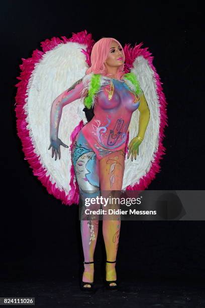 Model poses with her bodypainting designed by bodypainting artist Karen Dinger from Germany during the World Bodypainting Festival 2017 on July 28,...