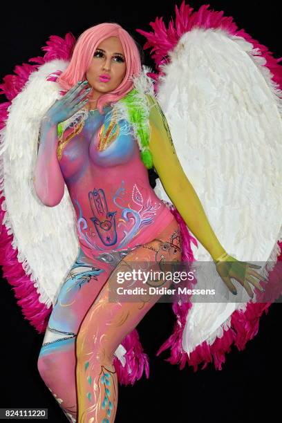 Model poses with her bodypainting designed by bodypainting artist Karen Dinger from Germany during the World Bodypainting Festival 2017 on July 28,...