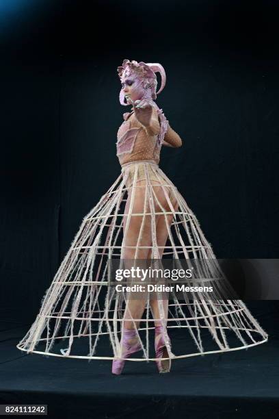 Model poses with her bodypainting designed by bodypainting artist Victoriia Bessarab from Ukraine during the World Bodypainting Festival 2017 on July...