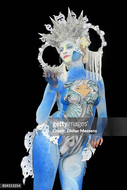 Model poses with her bodypainting designed by bodypainting artist Virginia Elizaebeth Vera from Uruguay during the World Bodypainting Festival 2017...
