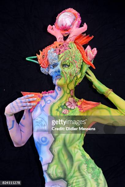 Model poses with her bodypainting designed by bodypainting artist Birgit Linke from Austria during the World Bodypainting Festival 2017 on July 28,...