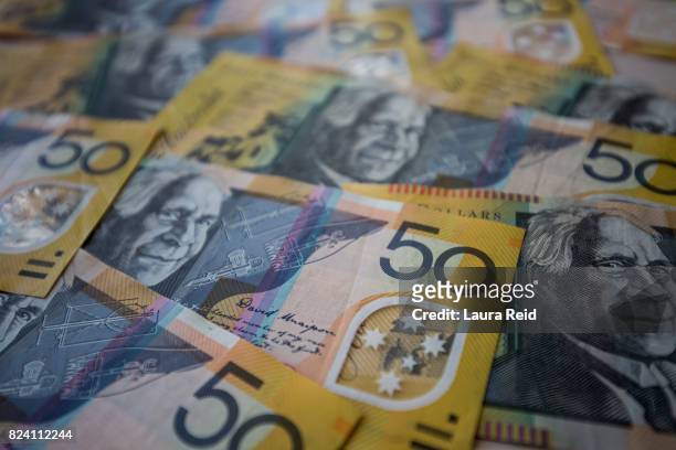 australian $50 notes - banknotes stock pictures, royalty-free photos & images