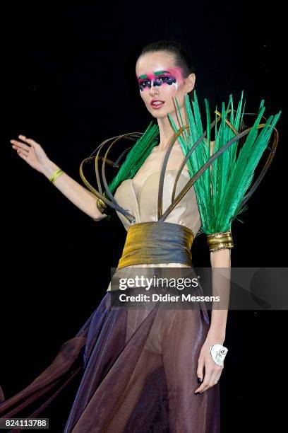 Model poses with her bodypainting designed by bodypainting artist Alesya Plastinkina from Russia during the World Bodypainting Festival 2017 on July...