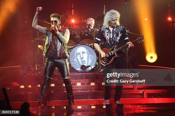 Singer Adam Lambert drummer Roger Taylor and guitarist Brian May of Queen perform on stage at Barclays Center of Brooklyn on July 28, 2017 in the...
