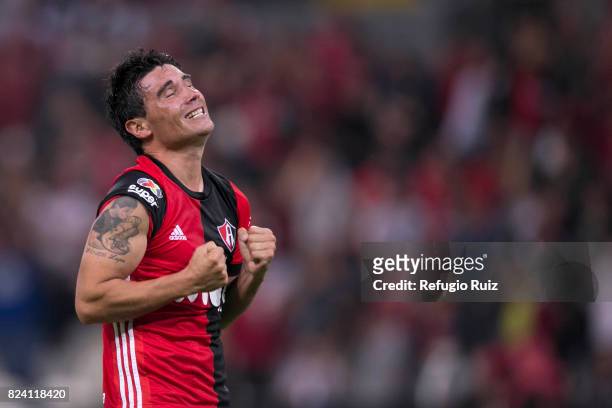 Gustavo Alustiza of Atlas celebrates after scoring the second goal of his team during the 2nd round match between Atlas and Pumas UNAM as part of the...