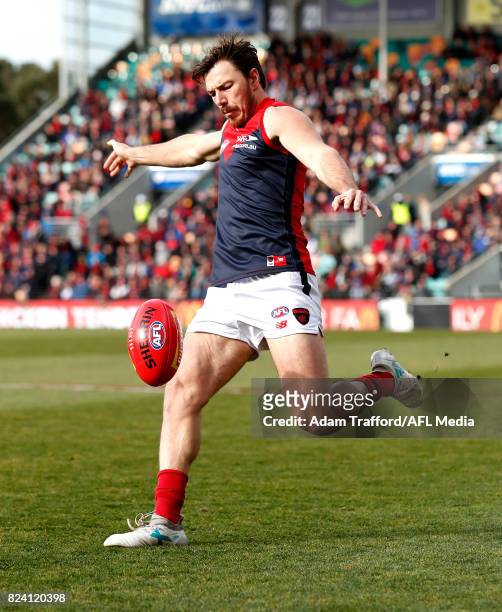 Michael Hibberd of the Demons kicks the ball during the 2017 AFL round 19 match between the North Melbourne Kangaroos and the Melbourne Demons at...