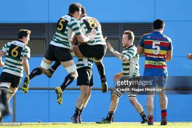 Old Boys-University players celebrate a try during the Jubilee Cup Semi Final match between Old Boys-University and Tawa at Jerry Collins Stadium on...