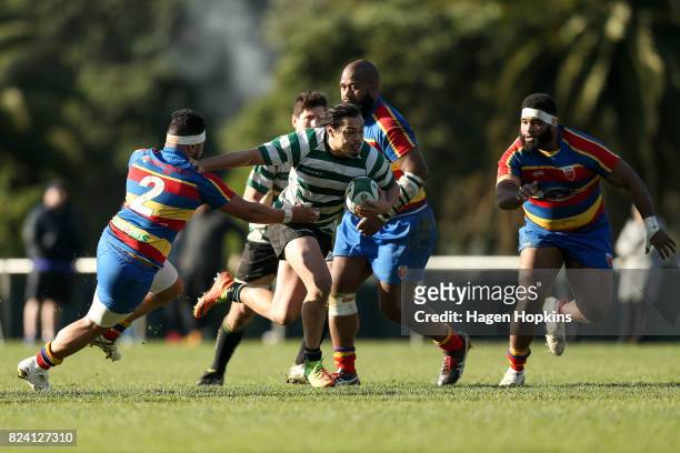 Te Wehi Wright of Old Boys-University fends Lotu Nuku of Tawa during the Jubilee Cup Semi Final match between Old Boys-University and Tawa at Jerry...