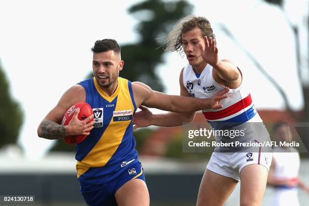 Jake Greiser of Williamstown runs during the round 15 VFL match between Williamstown and Footscray at Burbank Oval on July 29, 2017 in Melbourne,...