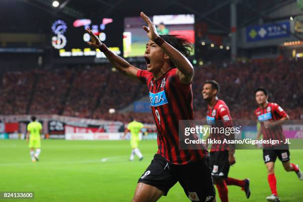 Ken Tokura of Consadole Sapporo celebrates scoring the opening goal during the J.League J1 match between Consadole Sapporo and Urawa Red Diamonds at...