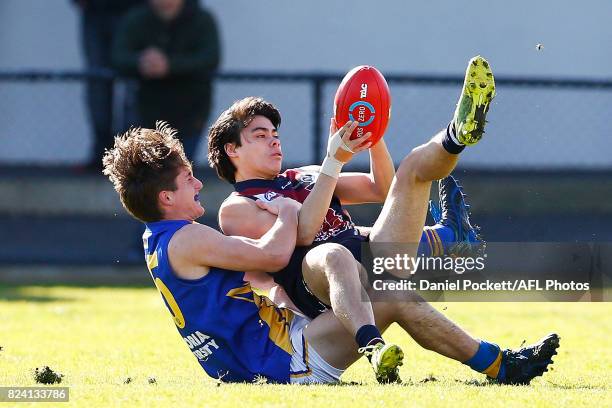 Aaron Trusler of the Dragons is tackled during the round 14 TAC Cup match between Sandringham and the Western Jets at Frankston Oval on July 29, 2017...