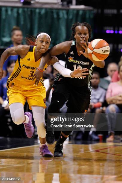 New York Liberty guard Epiphanny Prince battles with Indiana Fever guard Tiffany Mitchell for the loose ball during the game between the New York...