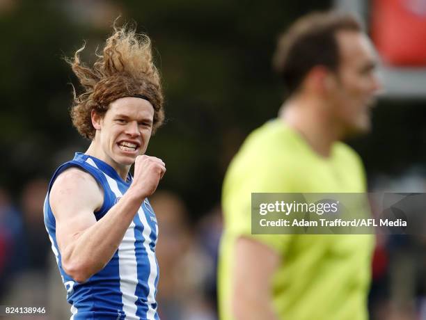 Ben Brown of the Kangaroos celebrates a goal during the 2017 AFL round 19 match between the North Melbourne Kangaroos and the Melbourne Demons at...