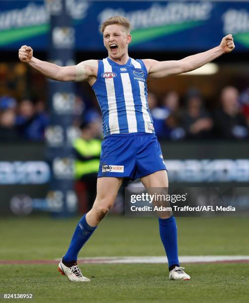 Jack Ziebell of the Kangaroos celebrates on the final siren during the 2017 AFL round 19 match between the North Melbourne Kangaroos and the...