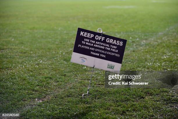 Keep Off Grass' sign is seen prior to the Super Rugby Semi Final match between the Crusaders and the Chiefs at AMI Stadium on July 29, 2017 in...