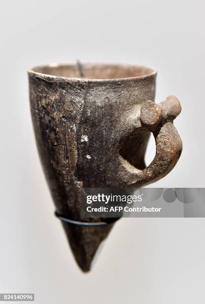 Colchidian cup for wine found in Georgia dating from the 8-7century BC sits on display at an exhibition at The Cité du Vin in Bordeaux on July 28,...