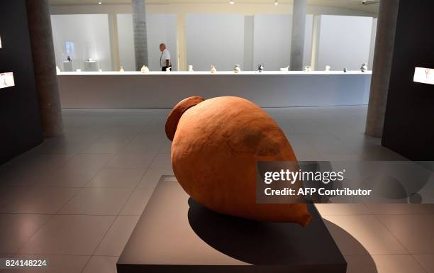 Terracotta wine jar or kvevris from Georgia sits on display at an exhibition at The Cité du Vin in Bordeaux on July 28, 2017. Georgia, said to be the...