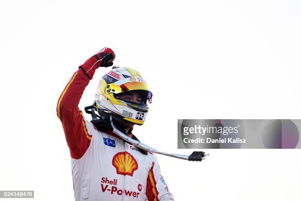 Scott McLaughlin driver of the Shell V-Power Racing Team Ford Falcon FGX celebrates after winning race 15 for the Ipswich SuperSprint, which is part...