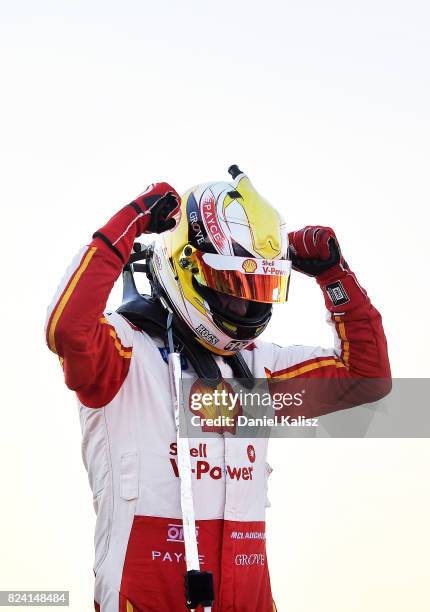 Scott McLaughlin driver of the Shell V-Power Racing Team Ford Falcon FGX celebrates after winning race 15 for the Ipswich SuperSprint, which is part...