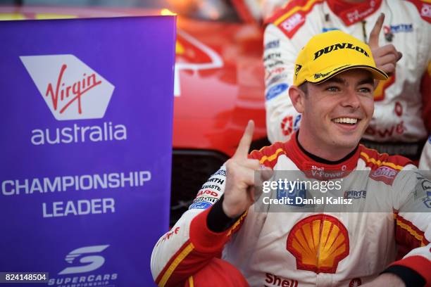 Scott McLaughlin driver of the Shell V-Power Racing Team Ford Falcon FGX celebrates after winning race 15 for the Ipswich SuperSprint, which is part...