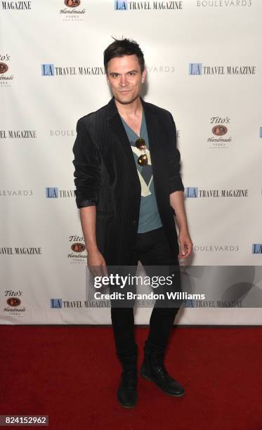 Actor Kash Hovey attends the party for the unveiling of Los Angeles Travel Magazin's "Endless Summer" issue at Boulevard3 on July 28, 2017 in...