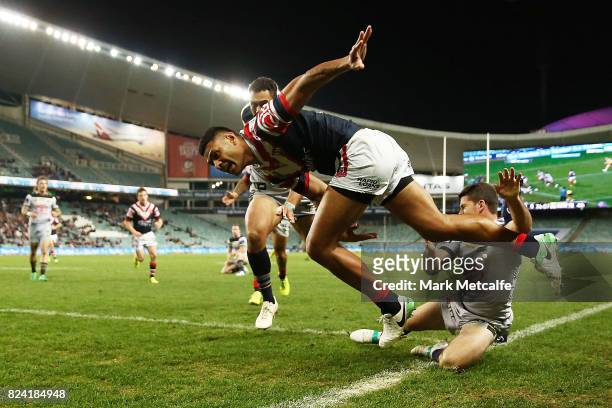 Daniel Tupou of the Roosters scores a try during the round 21 NRL match between the Sydney Roosters and the North Queensland Cowboys at Allianz...
