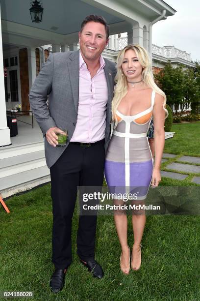 Guest and Andrea Catsimatidis attend Alzheimer's Association Hosts Rita Hayworth Gala Hamptons Kickoff Event at Private Residence on July 28, 2017 in...