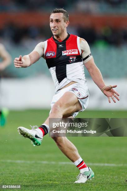 Luke Dunstan of the Saints kicks the ball during the round 19 AFL match between the Port Adelaide Power and the St Kilda Saints at Adelaide Oval on...