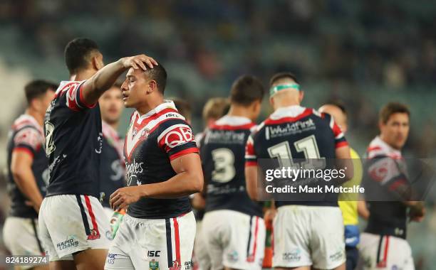 Sio Siua Taukeiaho of the Roosters celebrates scoring a try with team mates during the round 21 NRL match between the Sydney Roosters and the North...