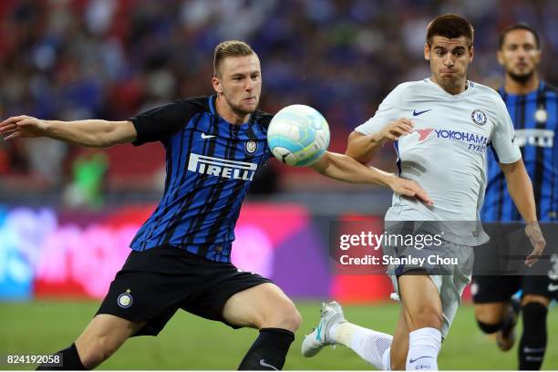 Milan Skriniar of FC Internazionale challenges Alvaro Morata of Chelsea FC during the International Champions Cup match between FC Internazionale and...