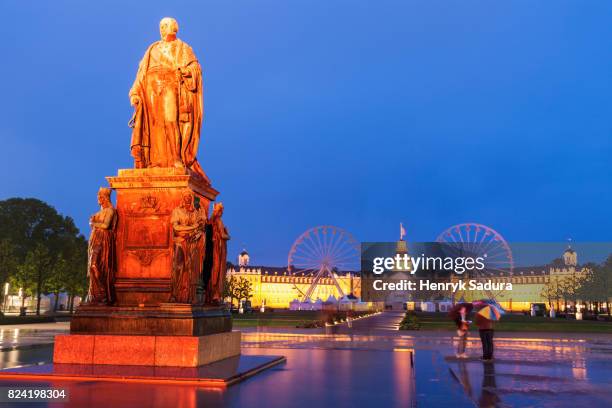 karl friedrichs von baden monument in front of karlsruhe palace - karlsruhe stock-fotos und bilder