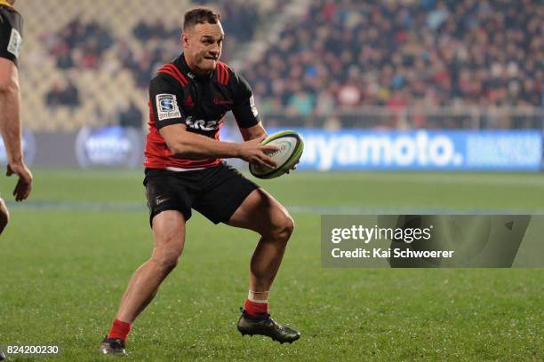 Israel Dagg of the Crusaders charges forward during the Super Rugby Semi Final match between the Crusaders and the Chiefs at AMI Stadium on July 29,...