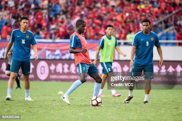 Ramires of Jiangsu Suning and Roger Martinez of Chongqing Lifan react during the 19th round match of 2017 Chinese Football Association Super League...