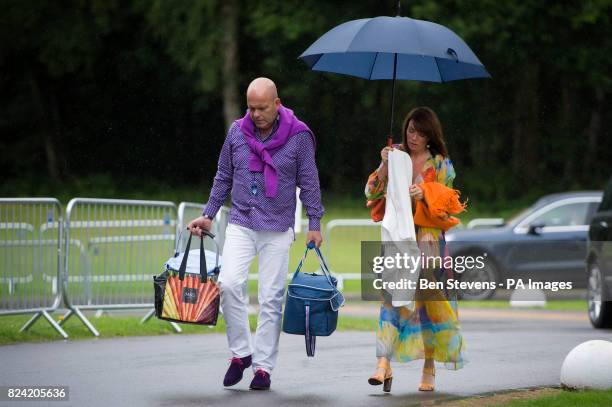 Spectators arrive at the Royal Salute Coronation Cup polo at Windsor Great Park in Surrey.