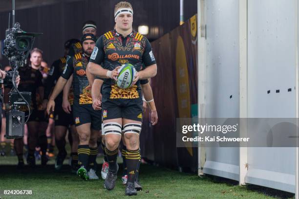 Sam Cane of the Chiefs leads his team onto the field prior to the Super Rugby Semi Final match between the Crusaders and the Chiefs at AMI Stadium on...