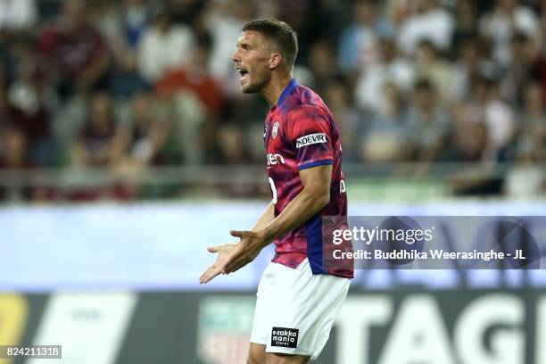 Lukas Podolski of Vissel Kobe reacts during the J.League J1 match between Vissel Kobe and Omiya Ardija at Noevir Stadium Kobe on July 29, 2017 in...