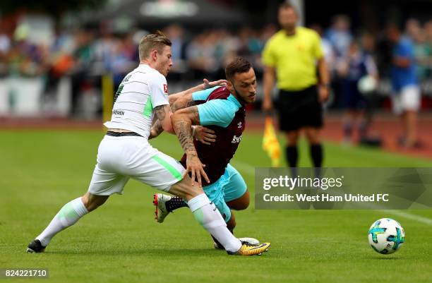 Florian Kainz of Bremen and Marko Arnautovic of West Ham battle for the ball during the pre-season friendly match between Werder Bremen and West Ham...