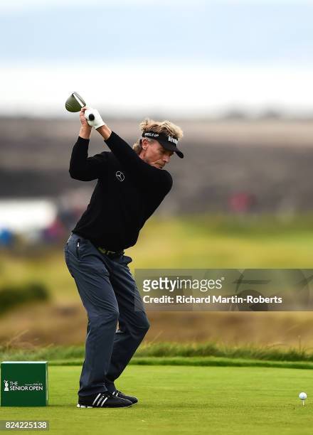 Bernhard Langer of Germany tees off on the 3rd hole during the third round of the Senior Open Championship presented by Rolex at Royal Porthcawl Golf...